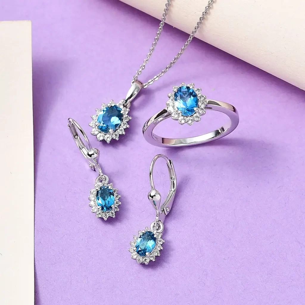 best jewelry under $50 London Blue Topaz and White Topaz Lever Back Earrings, Sunburst Ring and Pendant Necklace