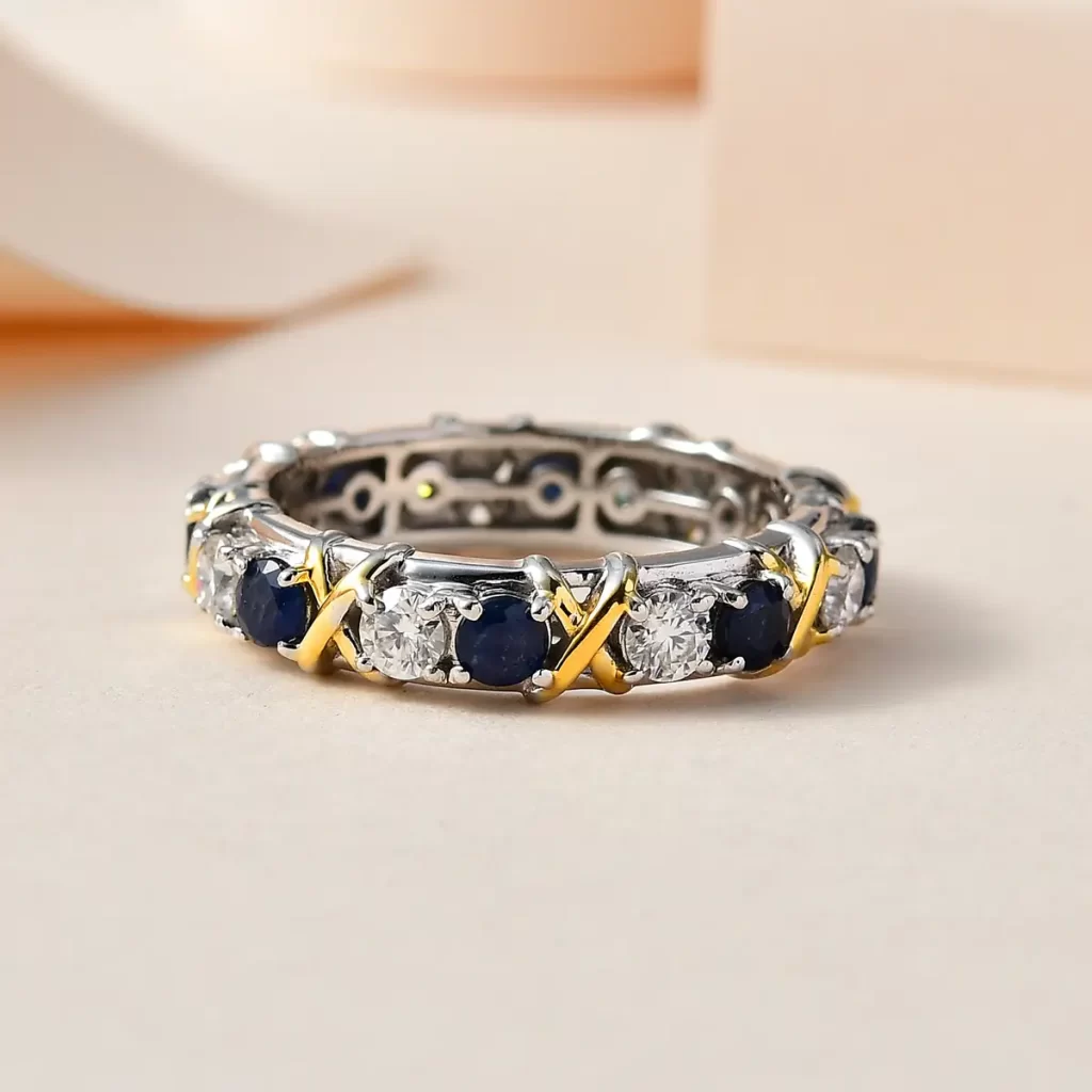 Doorbuster Blue Sapphire and Moissanite XO Band Ring in Platinum Over Sterling Silver